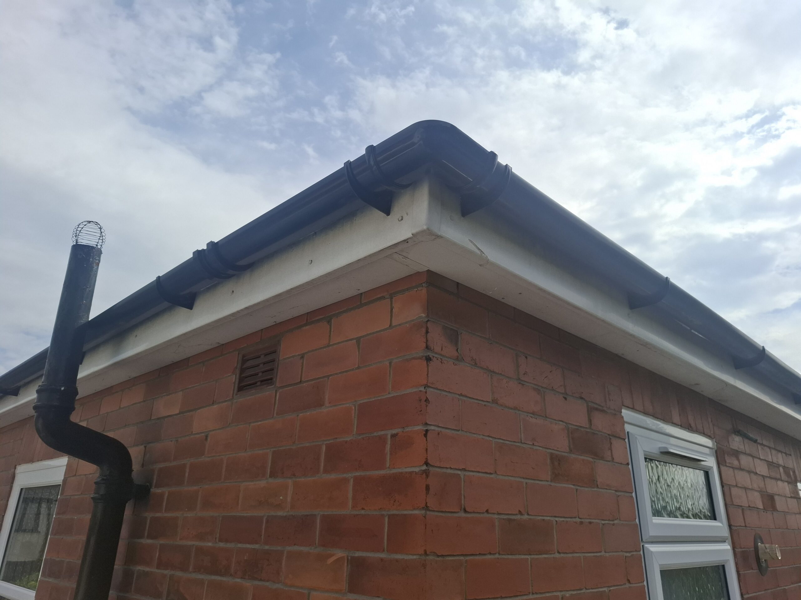 Wide angle view of restored guttering on corner of house in Fulwood.