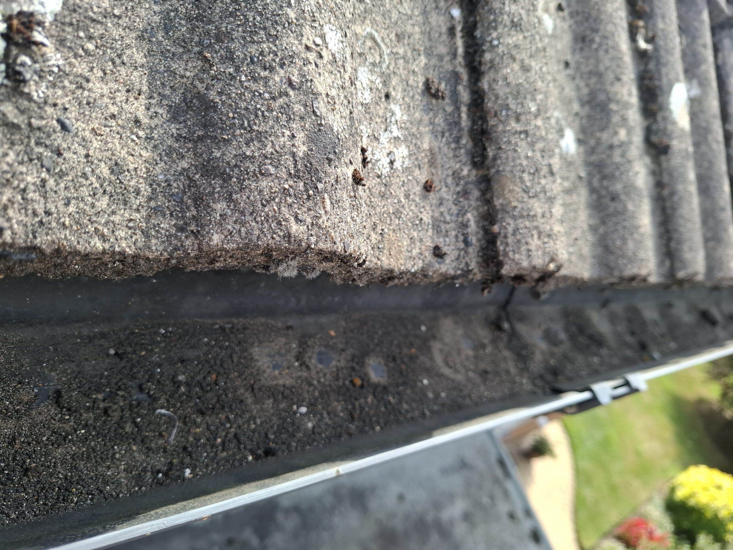 Close up view of gutter during cleaning Inskip.