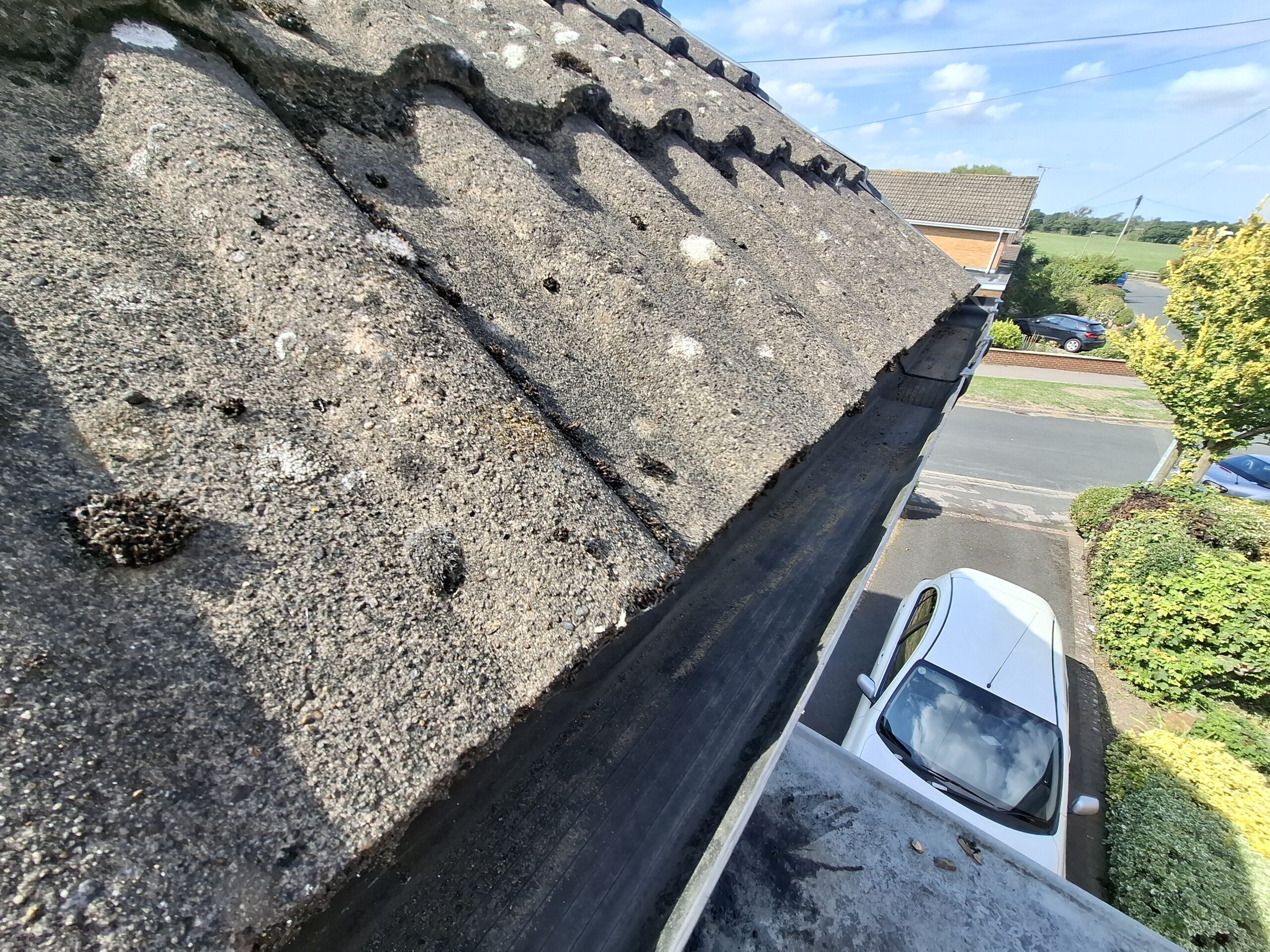 Wide angled view of cleaned gutter completed in Inskip.