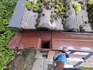 Downspout and upper guttering cleaned out removing all fallen dried leaves.
